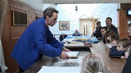 A Papermaking demonstration at the Wookey Hole Papermill